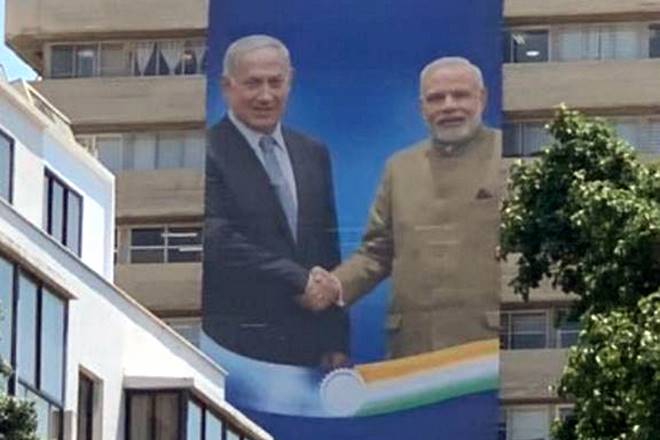 A banner showing is Israeli Prime Minister Benjamin Netanyahu with Indian Prime Minister Narendra Modi at Likud Party's headquarters in Tel Aviv. (PTI Photo)