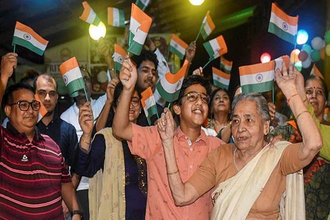 Kashmiri people celebrate the revocation of Article 370 from J & K, in Indore, Monday, Aug 5, 2019. (PTI Photo) 