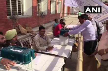 Polling officers leave from Ambala for their respective polling booths ahead of Haryana Assembly Polls on Monday. (ANI Photo)