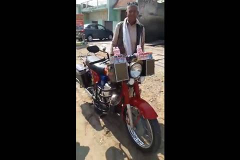 Pakistani diesel motorcycle that can park itself, sense gestures and play music!
