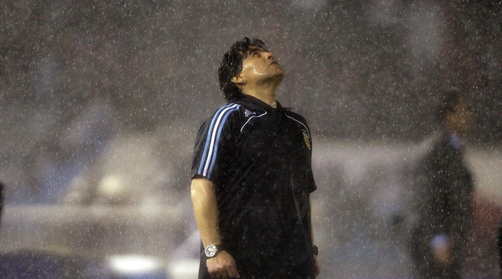 Copies of Italian newspapers headline on soccer legend Diego Maradona's death, in Rome. (AP Photo)