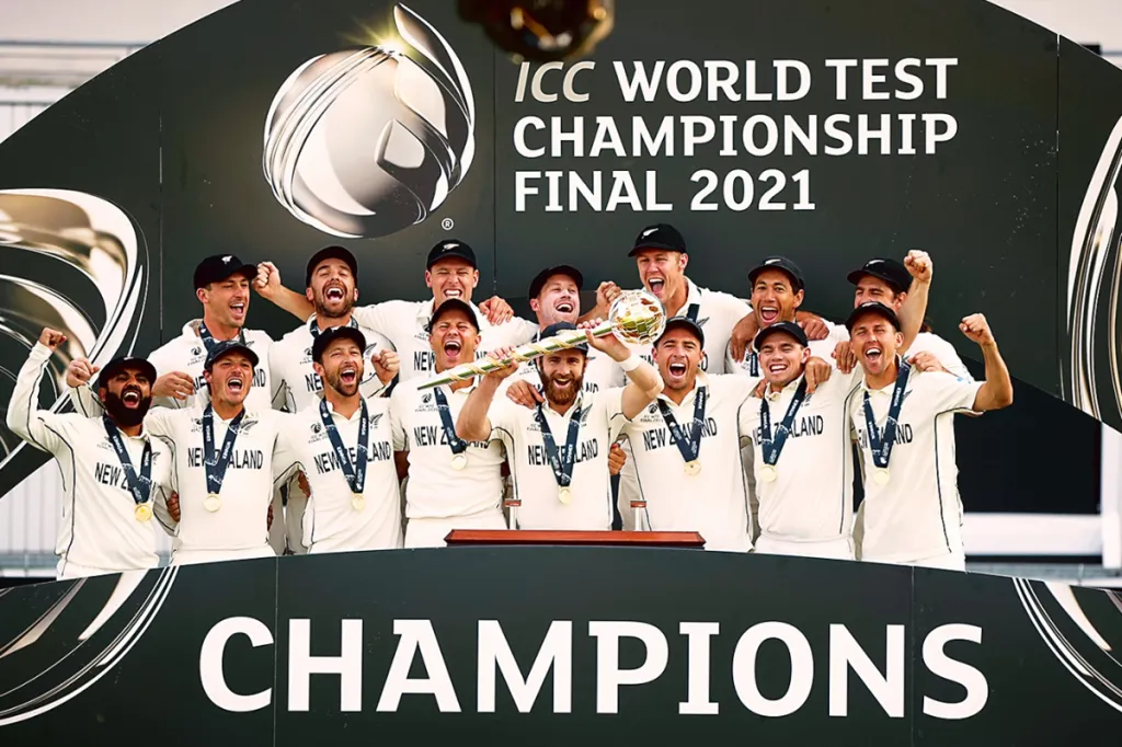 New Zealand's Kane Williamson with the trophy and teammates after the final win at the ICC World Test Championship (Image: Reuters)