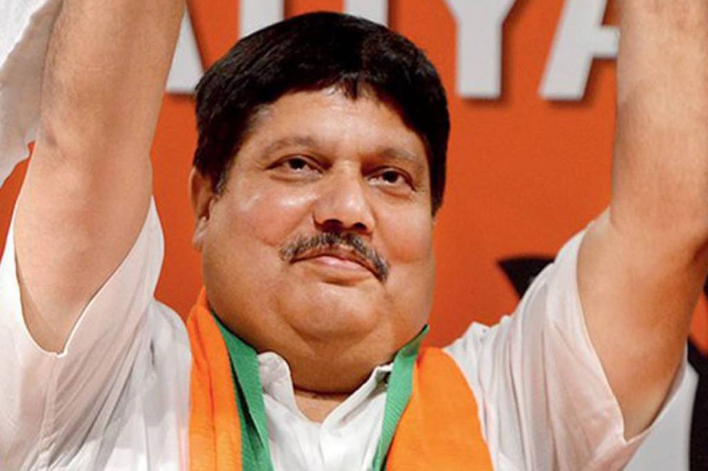 Three crude bombs were thrown at BJP MP Arjun Singh's residence in West Bengal's North 24 Parganas district on Tuesday night.