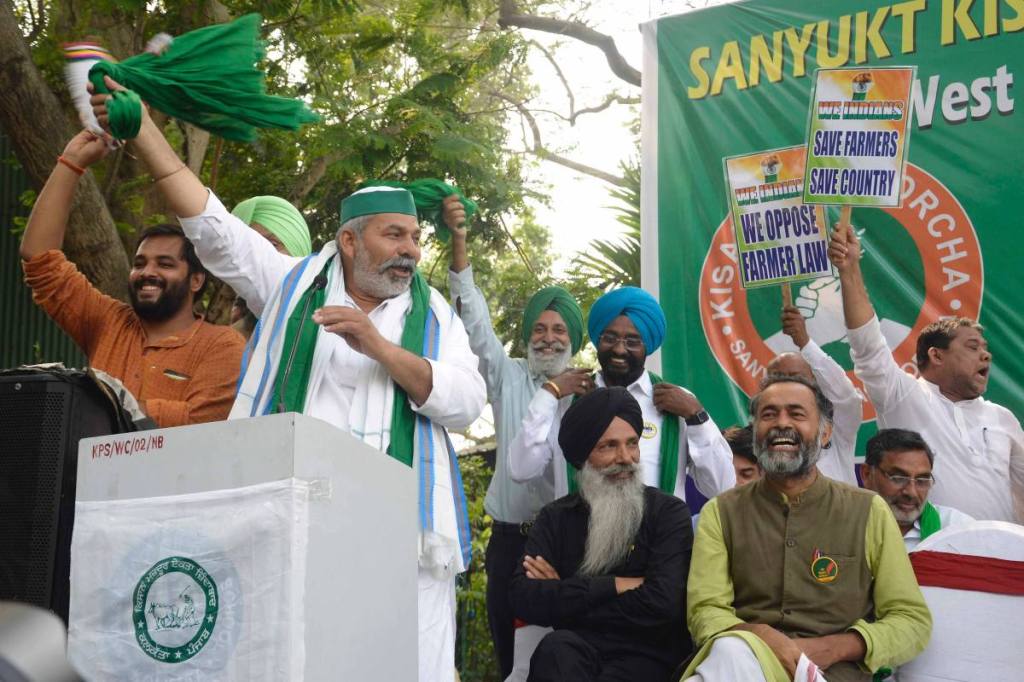 BKU spokesperson Rakesh Tikait and Yogendra Yadav of Samyukt Kisan Morcha during Mahapanchayat in front of Gandhi statue in Kolkata on March 12, 2021. (Express Photo)