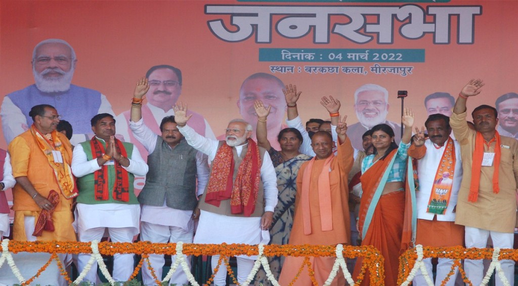 Prime Minister Narendra Modi with Uttar Pradesh CM Yogi Adityanath during an election campaign rally for BJP for the seventh and last phase of UP Assembly polls, in Mirzapur (Image: PTI)