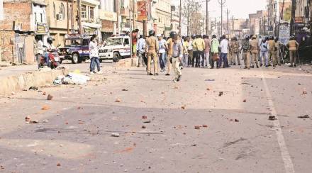 Police in action after the clash between two communities at Nai Sadak area of Kanpur on Friday. (Express photo)