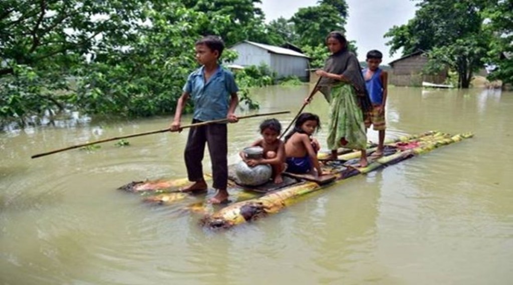 The deluge has hit 93 revenue circles and 3,510 villages, while 2,65,788 people have taken shelter in 717 relief camps. (Reuters)