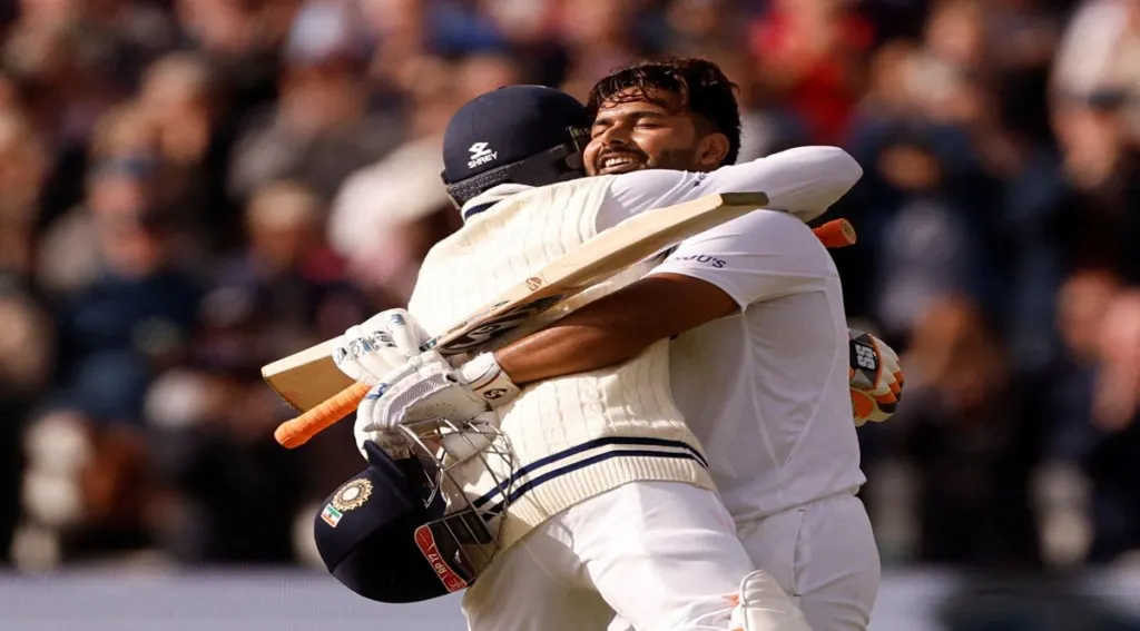 Rishabh Pant celebrates reaching his century with Ravindra Jadeja at the Fifth Test - England v India - in Birmingham (Reuters image)