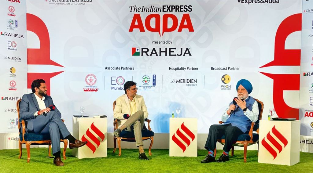 (From right) Union Minister Hardeep Singh Puri with P Vaidyanathan Iyer, Executive Editor, The Indian Express, and Anant Goenka, Executive Director, The Indian Express