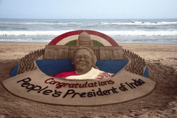 A sand sculpture of Droupadi Murmu, who is elected as India's first woman tribal President in Puri. (PTI Photo)
