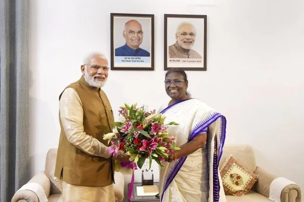Prime Minister Narendra Modi with NDA Presidential candidate Droupadi Murmu, who elected as first tribal woman President of India, in New Delhi. (PTI Photo)