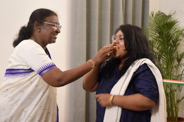 President-elect Droupadi Murmu celebrates with her daughter Itishri Murmu, in New Delh. (PTI Photo)