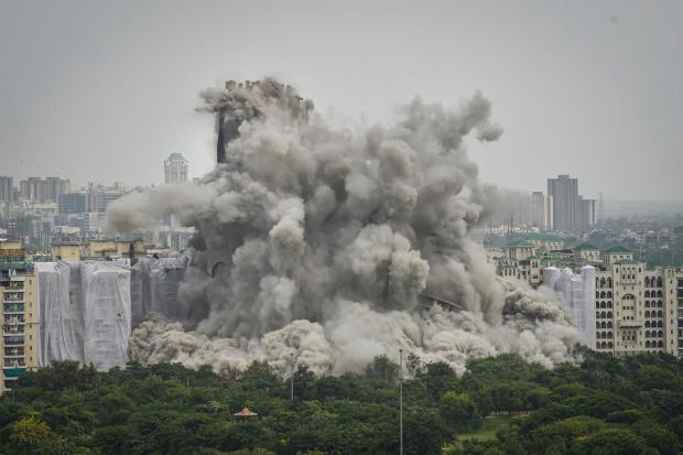 The Apex (32 floors) and Ceyane (29 floors) towers were under construction since 2009 within the Supertech Emerald Court housing society in Sector 93A of Noida, adjoining the national capital of Delhi.  (PTI Photo)