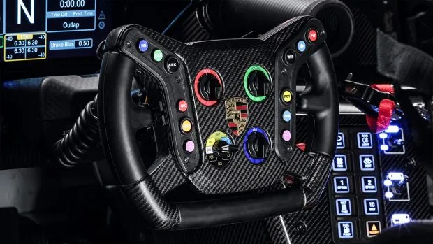 There is a racing steering wheel with a whole host of controls and paddle shifters behind it. The car also comes with a 10.3-inch display that has been adopted from the one-make cup racer. There is no space for a passenger and you will most definitely not be missing the company of anyone when behind the wheel of the 911 GT3 R. Just like the exterior, there are plenty of carbon fibre surfaces on the inside too.
