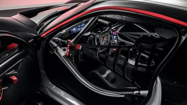 The inside of the 911 GT3 R has been fitted with a roll cage and gets the new FIA side impact protection for added safety. Even the driver seat has been moved closer to the centre for a better seating position. Porsche engineers have also worked on making the six-point seatbelts easier and quicker to secure during pit stops.