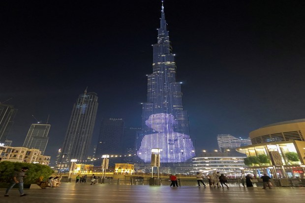 An image of Britain's Queen Elizabeth is displayed on the Burj Khalifa building, following her death, in Dubai, United Arab Emirates. REUTERS