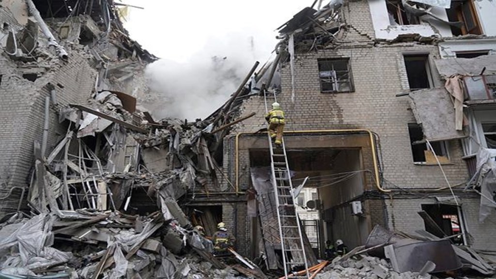 Ukrainian firefighters work in a destroyed building after the latest Russian rocket attack in center Kharkiv, Ukraine, Tuesday, Sept. 6, 2022. (AP/PTI)