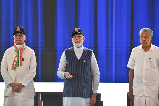 Kochi: Prime Minister Narendra Modi unveils the Indian Navy’s new ensign during the commissioning ceremony. Kerala Governor Arif Mohammad Khan and CM Pinarayi Vijayan (PTI Photo)