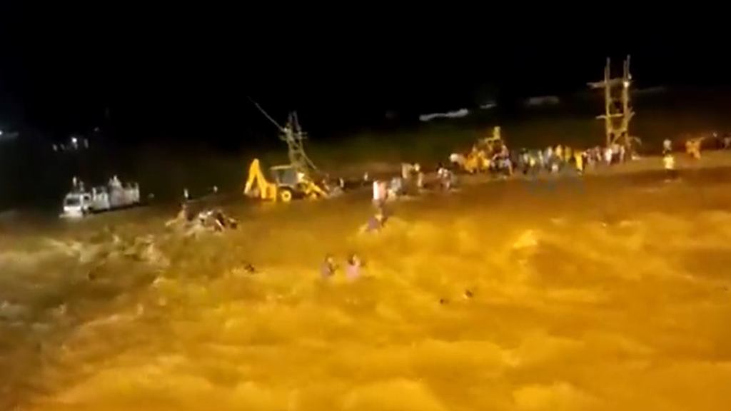 Visuals from the spot showed people struggling against the river current as they tried to move to the bank. (Photo: ANI)