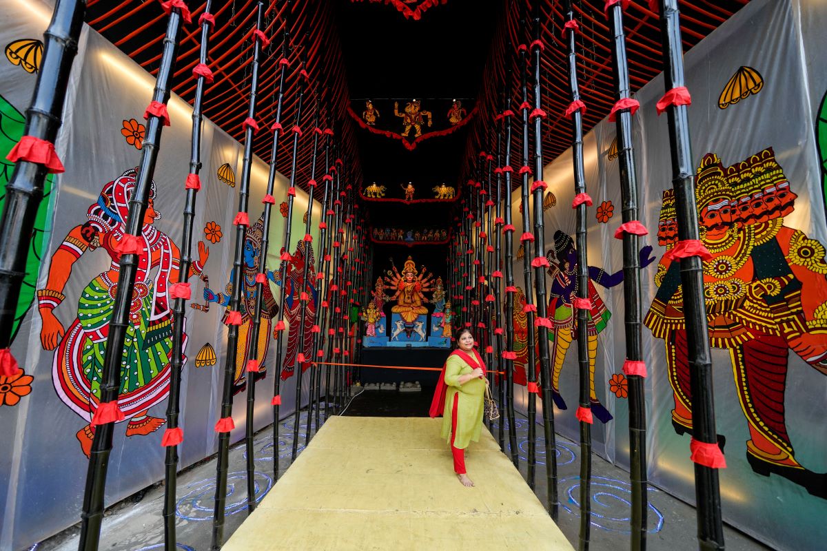 A devotee visits a makeshift worship place ahead of Hindu festival Durga Puja in Kolkata. Durga Puja festival will be celebrated from Oct. 2 to 5. (AP Photo)