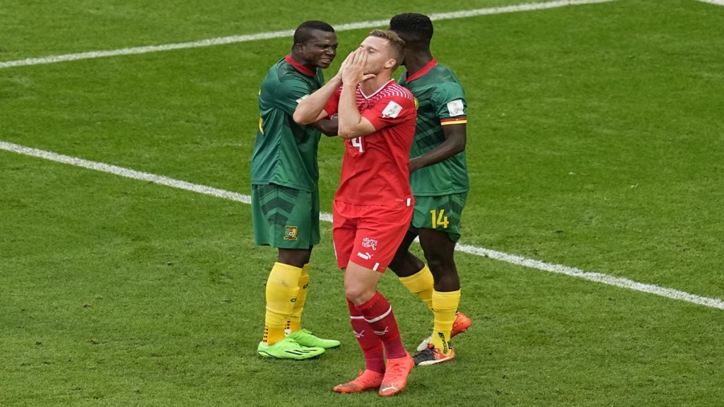 Switzerland's Nico Elvedi reacts after missing a chance during the World Cup group G soccer match between Switzerland and Cameroon, at the Al Janoub Stadium in Al Wakrah, Qatar (AP Photo)