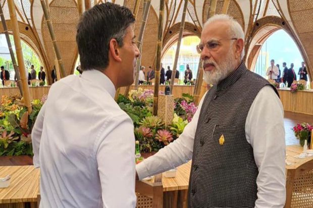 Prime Minister Narendra Modi and UK President Rishi Sunak in conversation during the first day of the G20 Summit in Bali. (Photo: Twitter/PMO India)