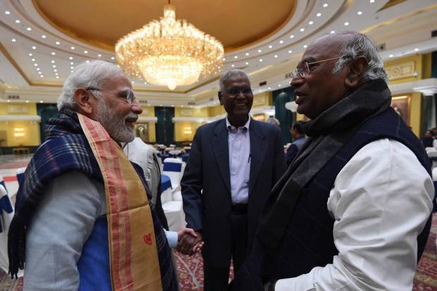 Prime Minister Narendra Modi with Congress President Mallikarjun Kharge with CPI National General Secretary, D. Raja during the all-party meeting on G20 summit, in New Delhi. (PTI Photo)