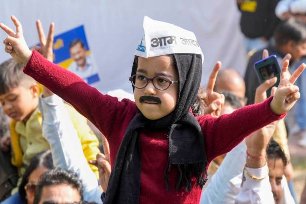 A child dressed as Delhi Chief Minister Arvind Kejriwal takes part in the celebrations of AAP's victory in the MCD polls, in New Delhi. (PTI Photo)