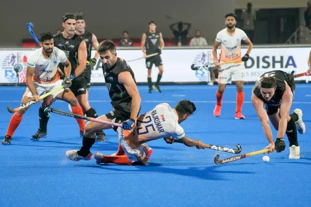 Bhubaneswar: India's Raj Kumar Pal is fouled by New Zealand's Kane Russell in the penalty area during a match between India and New Zealand, in the 2023 Men's FIH Hockey World Cup, in Bhubaneswar, Sunday, Jan. 22, 2023. (PTI Photo/Gurinder Osan)
