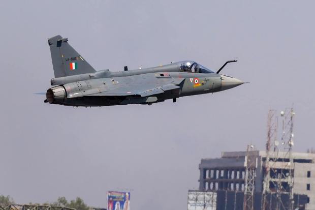 Bengaluru: Indian Air Force's 'Tejas' aircraft takes off for a sortie during the second day of Aero India 2023, at Yelahanka air base in Bengaluru, Tuesday, Feb. 14, 2023. (PTI Photo/Shailendra Bhojak)(PTI02_14_2023_000128B)