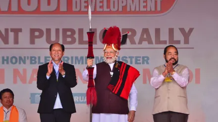 Prime Minister Narendra Modi after being presented with Naga traditional attires by Nagaland Chief Minister Neiphiu Rio (L) during a public rally ahead of the Nagaland Assembly election in Chumukedima, Nagaland, Friday, Feb. 24, 2023. (PTI Photo) 