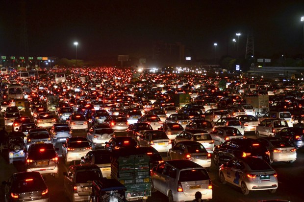 Vehicles were stuck in a traffic jam on the Delhi-Gurugram Road after the authorities closed one carriageway and created a diversion for construction on the Dwarka Expressway. (Photo: PTI)