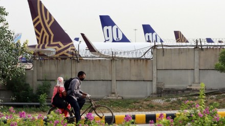 economy, monopoly, airlines, private airline, economic growth, competition, Mukesh Ambani, Gautam Adani, Tata Group, assets, domestic sectors, import tariffs, Go Airlines