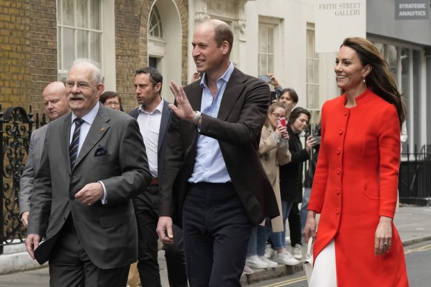 Prince William and Kate, Princess of Wales view Coronation preparations in the Soho area of central London in London, Thursday. (Photo: AP)