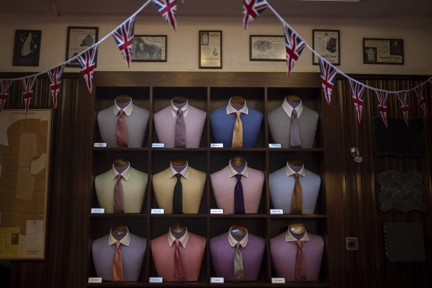 A renowned tailor's shop is photographed decorated prior to the Coronation of King Charles III in London on Friday. (Photo: AP)