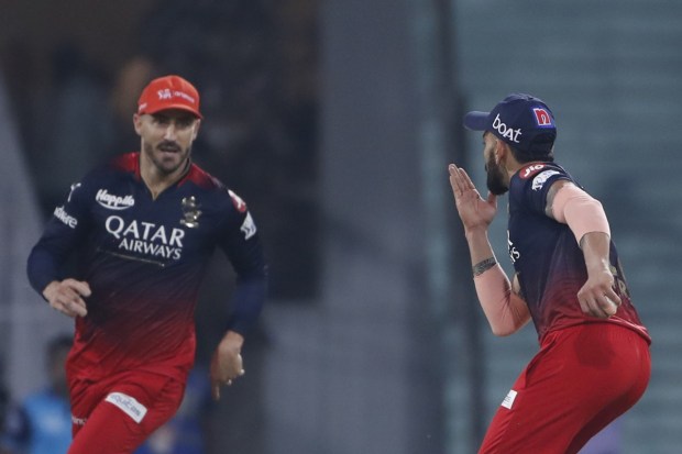 Royal Challengers Bangalore's captain Faf Du Plessis, left, and Virat Kohli celebrates the wicket of Lucknow Super Giants' Krunal Pandya during the IPL match between Lucknow Super Giants and Royal Challengers Bangalore in Lucknow. (Photo: AP)