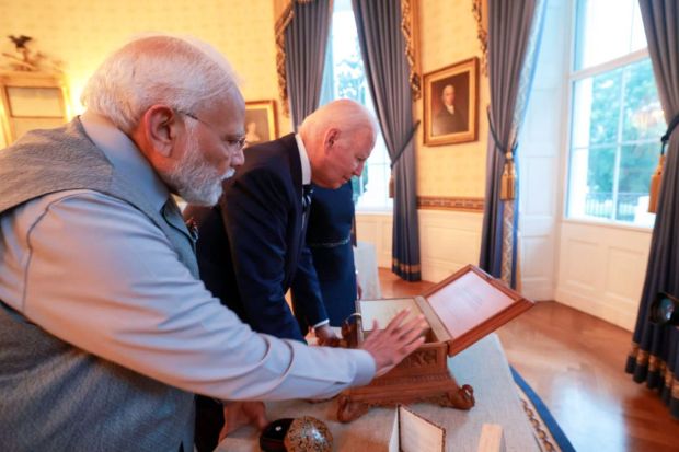 PM Modi gifted a handcrafted sandalwood box with 'das danam' to US President Joe Biden and a lab-grown green diamond to First Lady Jill Biden. The special sandalwood box presented to Biden has been handcrafted by a master craftsman from Jaipur, Rajasthan. The box contains a silver idol of Lord Ganesha, a diya (oil lamp) and copper plate which occupies a sacred space in every Hindu household. (Photo Credits: PTI)