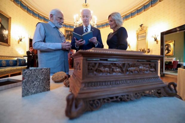PM Modi gifted a copy of the first edition print of this book, 'The Ten Principal Upanishads' published by M/s Faber and Faber Ltd of London and printed at the University Press Glasgow to US President Joe Biden.(Photo Credits: PTI)