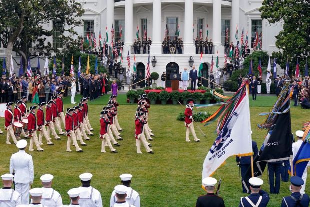 PM Narendra Modi with President Joe Biden as they watch the United States Army Old Guard Fife and Drum Corps during a State Arrival Ceremony on the South Lawn of the White House Thursday. (Photo Credits: AP)