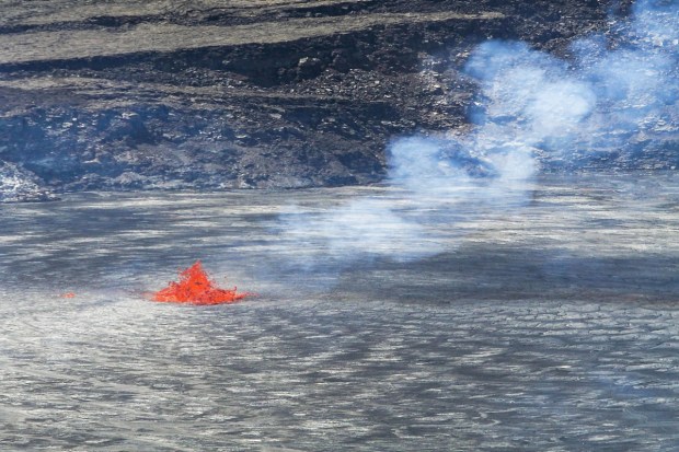 Lava fountains into a crater as Kilauea erupts in Hawaii on Wednesday, June 7, 2023. (Photo: AP)