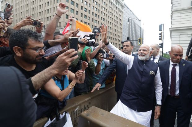 Prime Minister Narendra Modi meets with the Indian diaspora upon arrival in Washington DC on Wednesday. (Photo Credits: PTI)