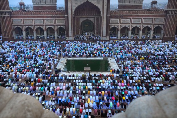 The day begins with prayers. (Image: Reuters)