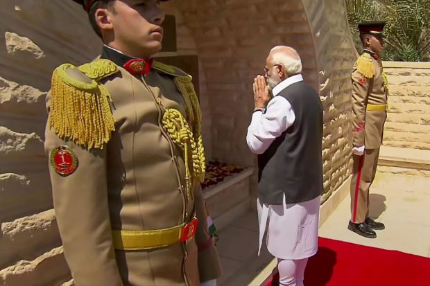 Prime Minister Narendra Modi pays homage to the Indian soldiers who died in World War I during his visit to Heliopolis War Cemetery, in Cairo, Egypt. (PTI Photo)