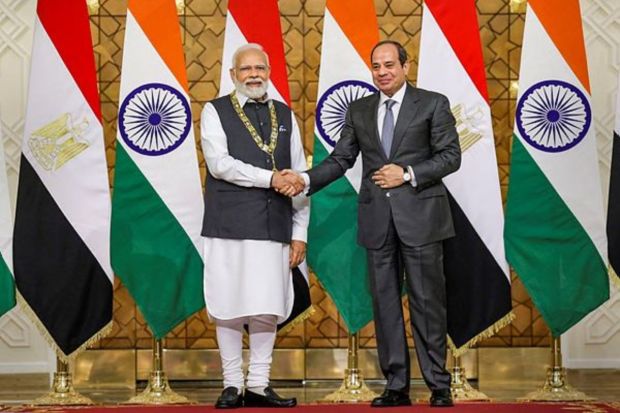 Eqyptian President Abdel Fattah El-Sisi confers Prime Minister Narendra Modi with 'Order of the Nile' award - Egypt's highest state honour, during their meeting in Cairo. (PTI Photo)