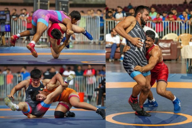 Wrestling trials have commenced for the Asian Games 2023 at Delhi's IGI Stadium. Today, July 22, featured the competitions for women's and men's Greco-Roman wrestlers, while men's freestyle wrestling bouts are scheduled for July 23. These trials will cover all 18 Olympic weight categories, with six categories each for women's and men's freestyle, and men's Greco-Roman at the upcoming Asian Games.Controversy surrounds the IOA-appointed ad hoc panel of the Wrestling Federation of India (WFI) for granting direct entries to the nation's top wrestlers, Bajrang Punia and Vinesh Phogat, into the Asian Games 2023. (All Images: PTI)