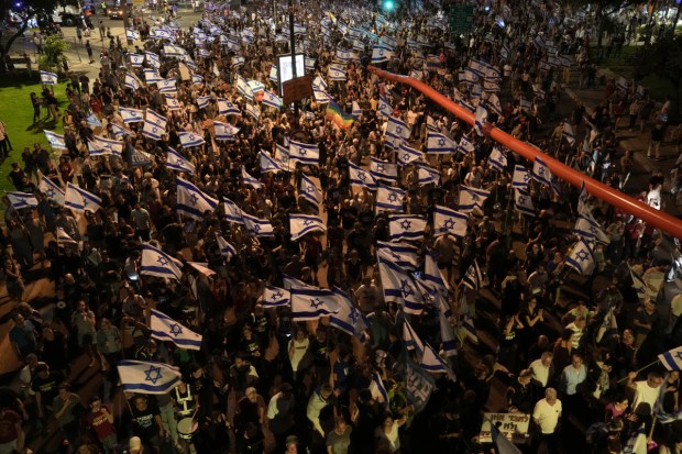 A protest also took place outside Netanyahu’s home in Jerusalem. (Image: AP)