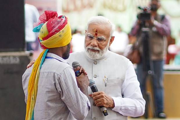 PM Modi walked amongst the audience during his interaction. (Image: PTI)