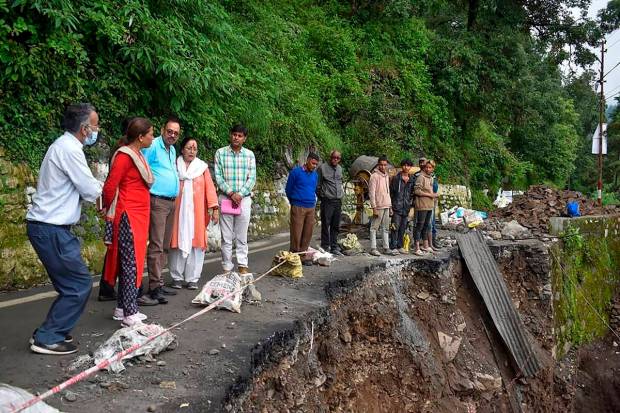 Uttarakhand Minister Rekha Arya inspects the flood-affected areas after recent heavy monsoon rains, in Nainital. (PTI Photo)
