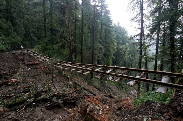 A damaged portion of Shimla-Kalka heritage rail track is pictured following torrential rain in Shimla in the northern state of Himachal Pradesh. REUTERS