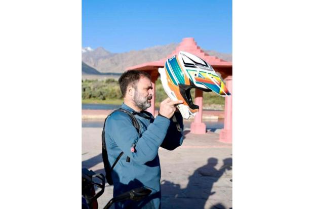 On Saturday, he was seen taking a motorcycle ride amidst the breathtaking scenery of Ladakh, making his way to Pangong Lake. (Image/PTI)